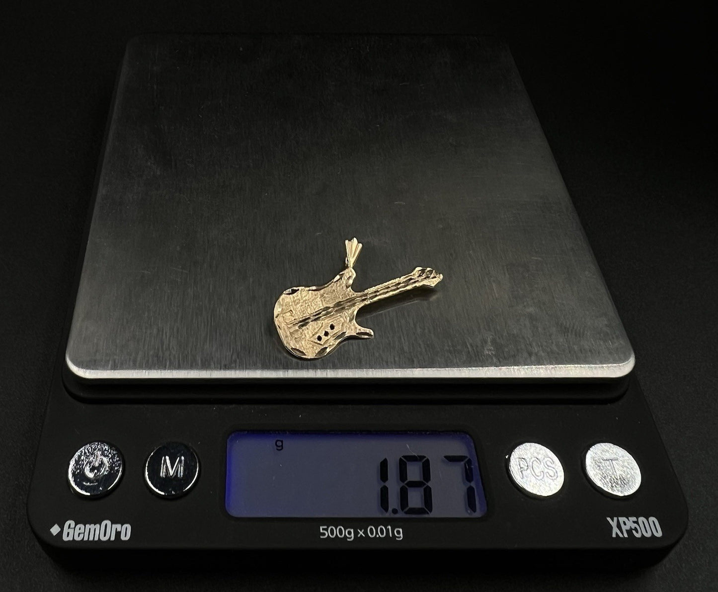 1.29” x .76” 14K Solid Yellow Gold Diamond Cut Guitar Pendant | 1.86g |