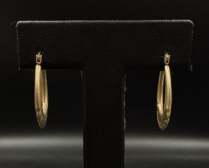 .81” 10K Hollow Yellow Gold Diamond Cut Hoop Earrings | 1.48g | 2.3mm Thick |