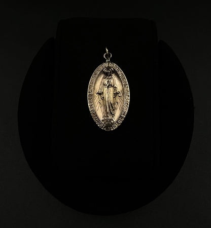 .65” x 1.3” 10K Hollow Yellow Gold Virgin Mary Pendant | 1.26g | 2.8mm Bail |
