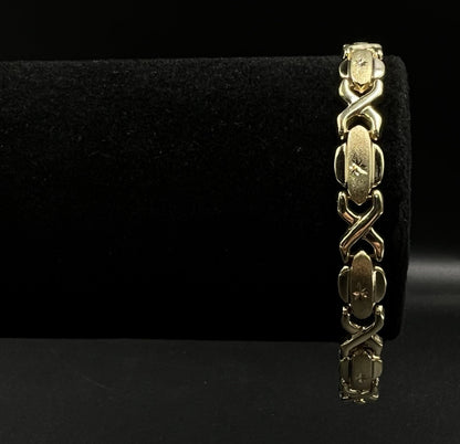 7.25” 10K Hollow Yellow Gold XO Bracelet | 7.49g | 7.2MM | Lobster Clasp |