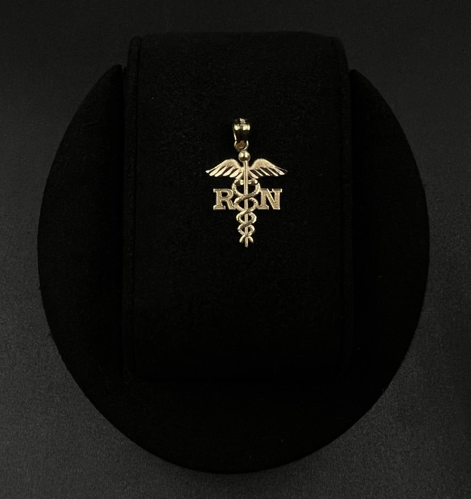 .58” x .9” 10K Semi-Solid Yellow Gold Diamond Cut RN Pendant | .54g | 3.2mm Bail