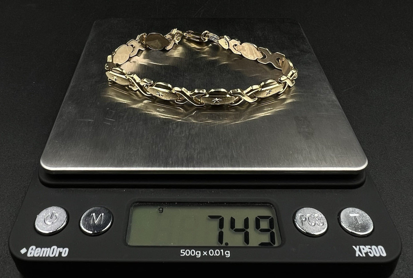 7.25” 10K Hollow Yellow Gold XO Bracelet | 7.49g | 7.2MM | Lobster Clasp |