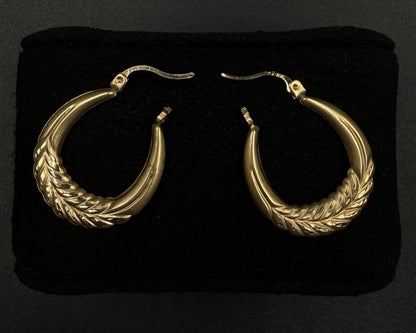 .81” 10K Hollow Yellow Gold Diamond Cut Hoop Earrings | 1.48g | 2.3mm Thick |