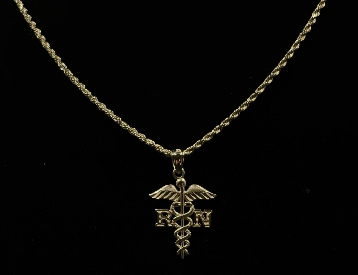.58” x .9” 10K Semi-Solid Yellow Gold Diamond Cut RN Pendant | .54g | 3.2mm Bail