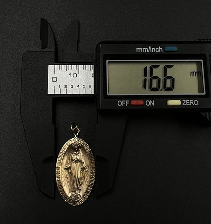 .65” x 1.3” 10K Hollow Yellow Gold Virgin Mary Pendant | 1.26g | 2.8mm Bail |