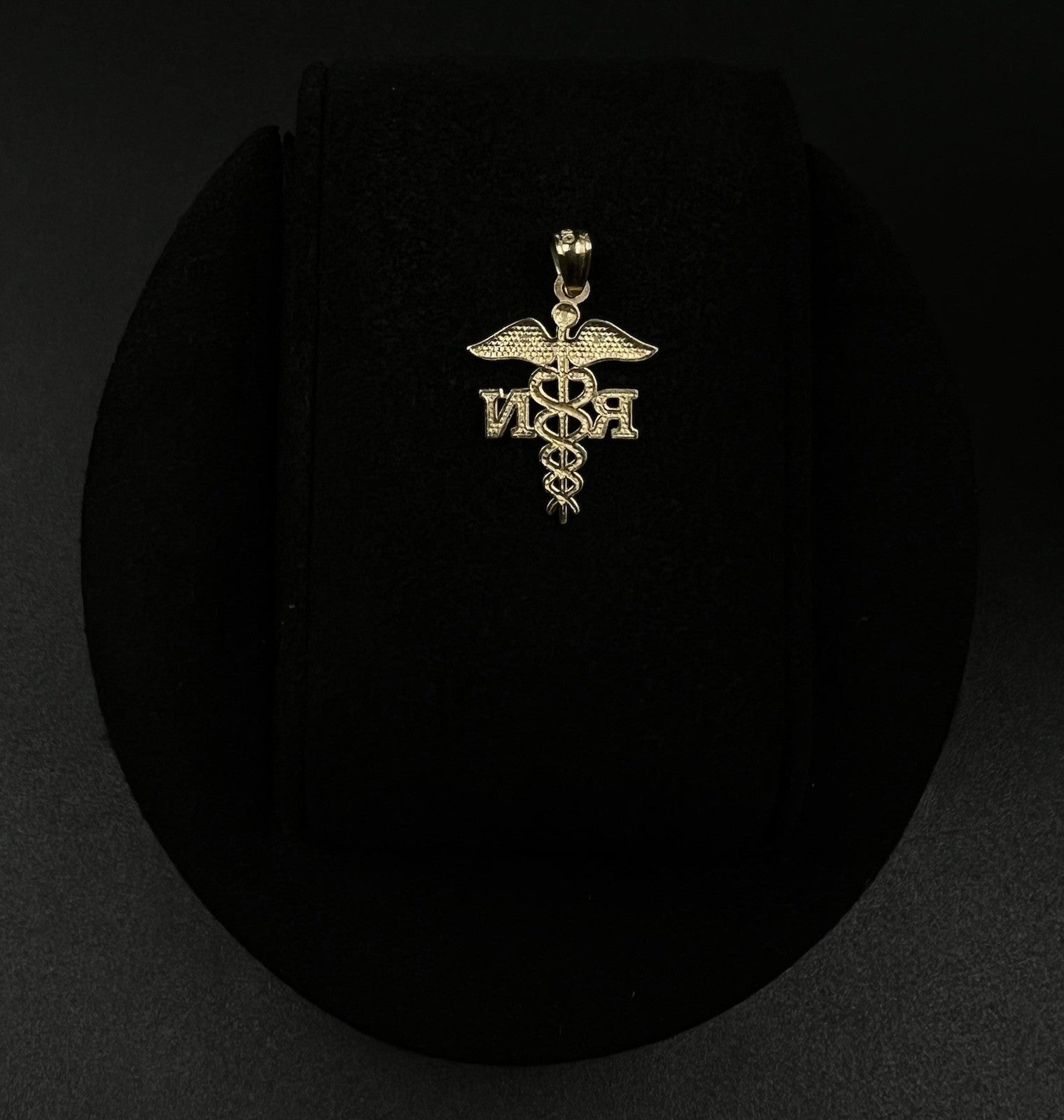 .58” x .9” 10K Semi-Solid Yellow Gold Diamond Cut RN Pendant | .54g | 3.2mm Bail