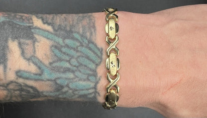 7.25” 10K Hollow Yellow Gold XO Bracelet | 7.49g | 7.2MM | Lobster Clasp |