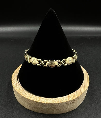 7.25” 10K Hollow Yellow Gold XO Bracelet | 7.49g | 7.2MM | Lobster Clasp |