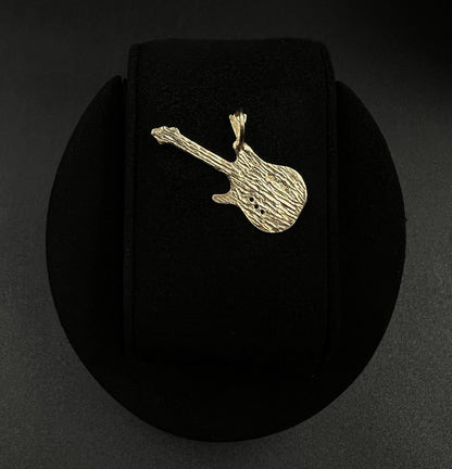 1.29” x .76” 14K Solid Yellow Gold Diamond Cut Guitar Pendant | 1.86g |
