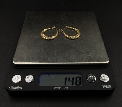 .81” 10K Hollow Yellow Gold Diamond Cut Hoop Earrings | 1.48g | 2.3mm Thick |
