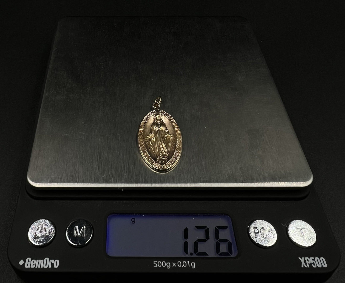 .65” x 1.3” 10K Hollow Yellow Gold Virgin Mary Pendant | 1.26g | 2.8mm Bail |