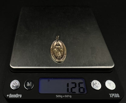 .65” x 1.3” 10K Hollow Yellow Gold Virgin Mary Pendant | 1.26g | 2.8mm Bail |